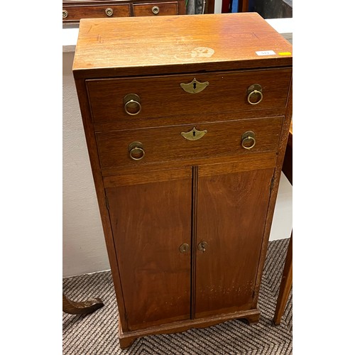 513 - 20th century oak cabinet; two drawers above two cabinet doors standing on shaped bracket feet; 100cm... 