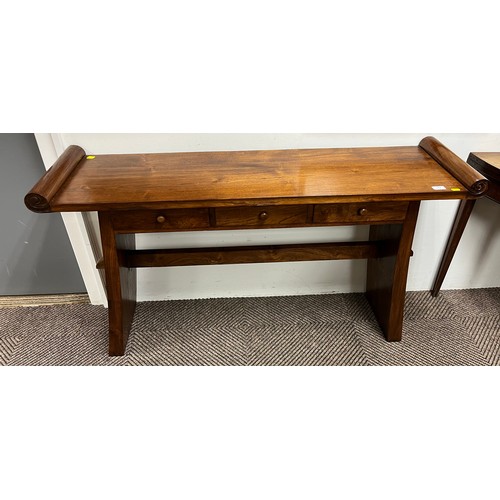 519 - Chinese style elm three drawer Alter table; 141cm wide; raised on outsplayed supports