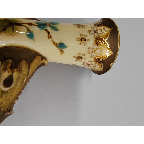 11 - 20th century Zsolnay Pecs porcelain twin handled vase; decorated with flowers; 28cm high