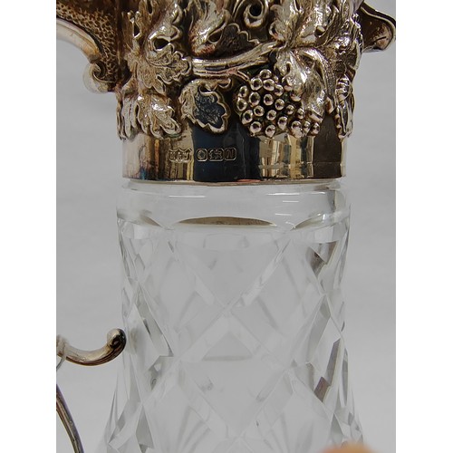 240 - Contemporary Mappin & Webb silver topped and handle cut glass claret jug; 31cm high