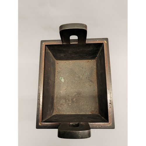 264 - Large Chinese bronze rectangular censer and cover; surmounted with Dog of Fo; with Greek Key and mas... 