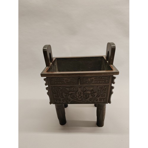 264 - Large Chinese bronze rectangular censer and cover; surmounted with Dog of Fo; with Greek Key and mas... 