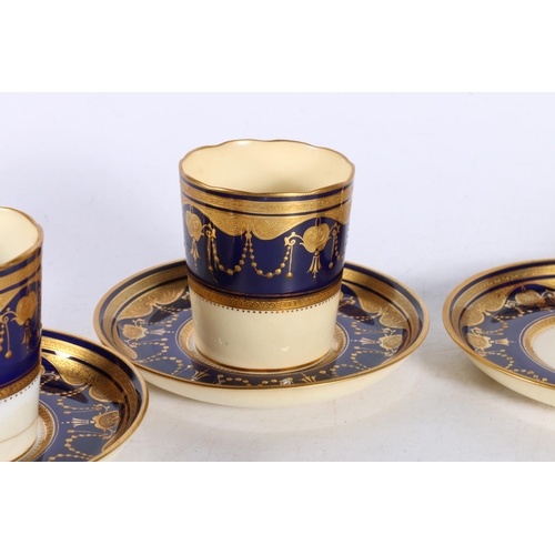 46 - Four early Minton blue and gilt decorated coffee cans and five matching saucers.