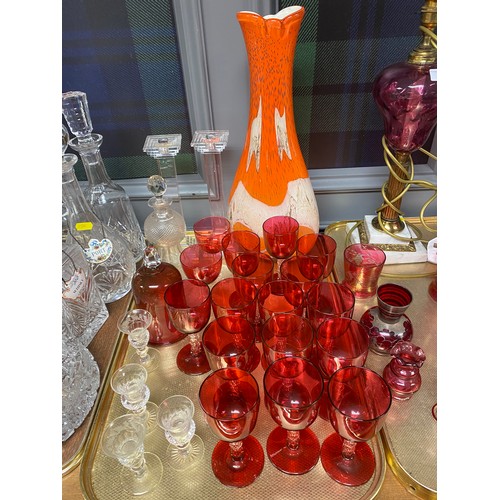 336 - Assortment of cranberry glass including, lamp  and other glassware including large orange and white ... 