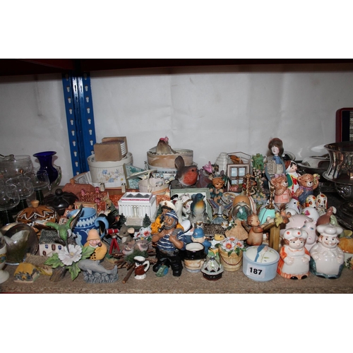 187 - Large collection of figures, novelty condiment sets, a Hummel figure, animal models, etc.