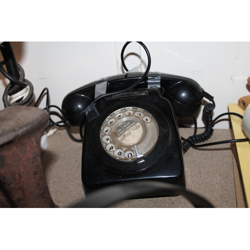 217 - Gladstone bag, a cobblers last, a vintage telephone, a griddle pan and a desk lamp.