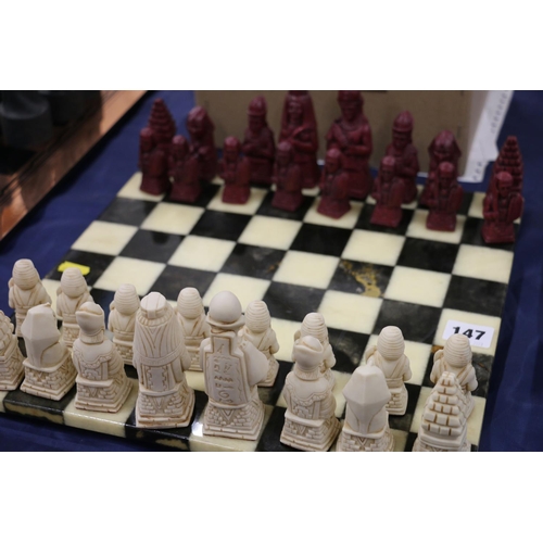 147 - Egyptian style chess set.