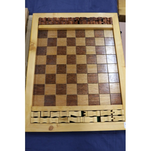 149 - Pine and mahogany varnished chess set.