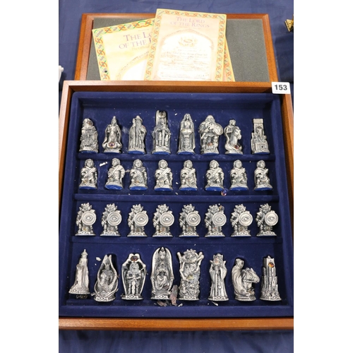 153 - Lord of the Rings chess set, plated in precious silver, set with sparkling faceted crystals.