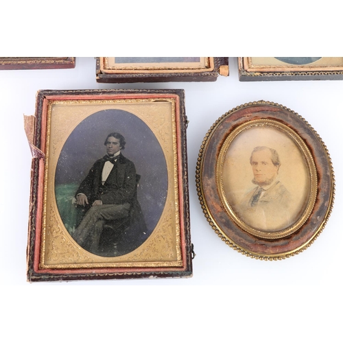 21 - Four framed daguerreotypes, and a framed oval miniature portrait.