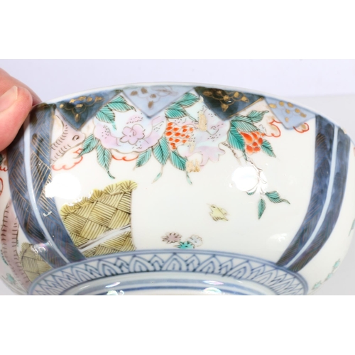 8 - Oriental bowl decorated with fan and flowers.