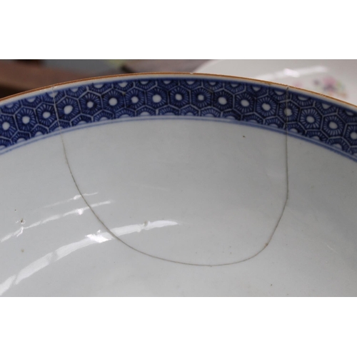 229 - Four pieces of 18th century Chinese porcelain, comprising: circular punch bowl with polychrome panel... 