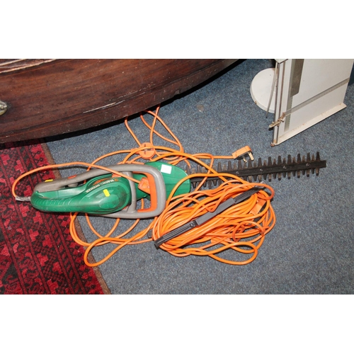 Black and Decker hedge trimmer and extending cables.