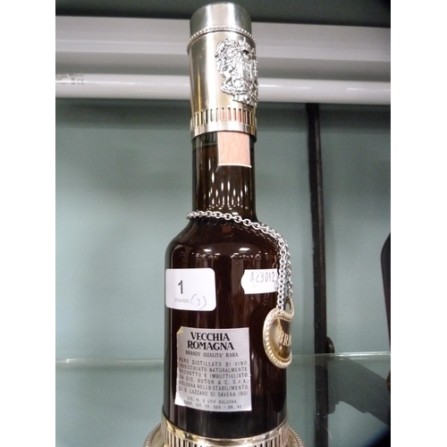 1 - Three bottles of cognac and brandy to include Vecchia Romagna Italian brandy with a plated lid and a... 