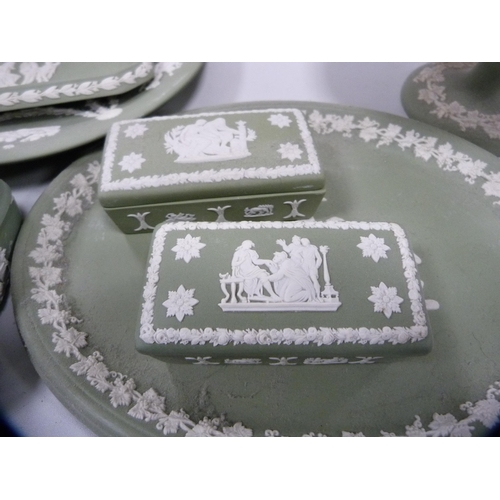 101 - Collection of Wedgwood green Jasper ware including boxes, dishes, vases, comport etc.