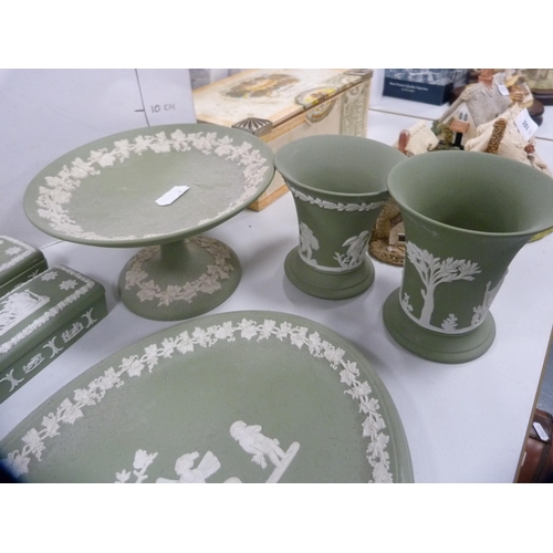 101 - Collection of Wedgwood green Jasper ware including boxes, dishes, vases, comport etc.
