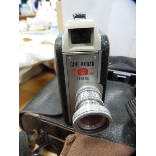 104 - Pair of Regent 10x50 binoculars, a Chinon camera and other cameras.