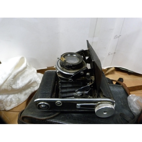 104 - Pair of Regent 10x50 binoculars, a Chinon camera and other cameras.