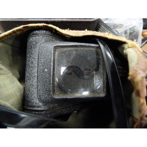 104 - Pair of Regent 10x50 binoculars, a Chinon camera and other cameras.