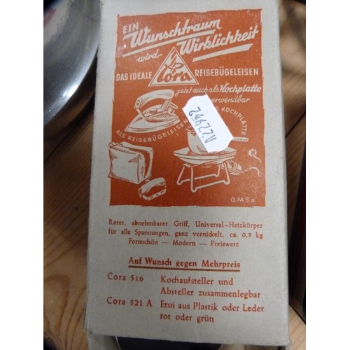 110 - Three-piece Picquot ware tea set, pair of brass candlesticks, travel iron etc.