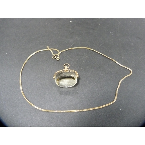 30 - 9ct gold chain, marked '9k', 2.9g, and a 9ct gold-mounted fob with citrine-style stone.