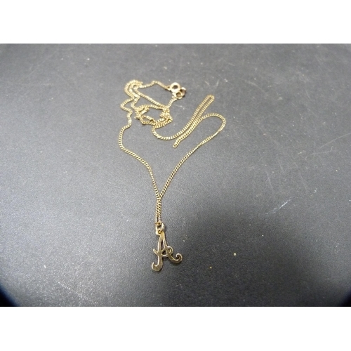 51 - 9ct gold letter pendant on chain, 1.9g.