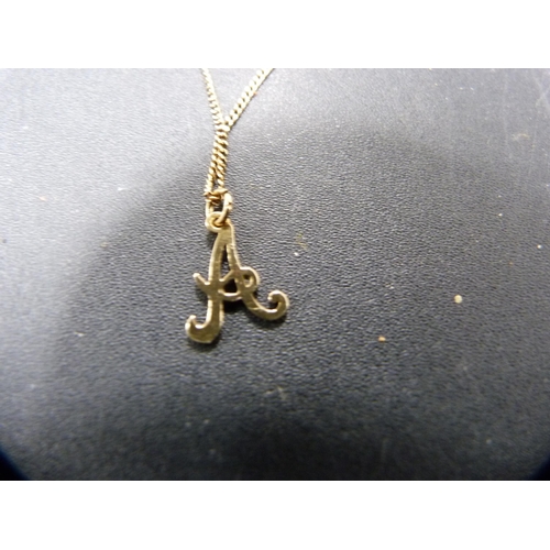 51 - 9ct gold letter pendant on chain, 1.9g.