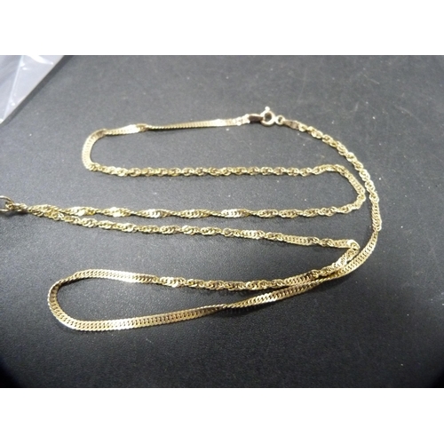 54 - 9ct gold chain with 9ct gold and garnet-style pendant, 10.4g gross.