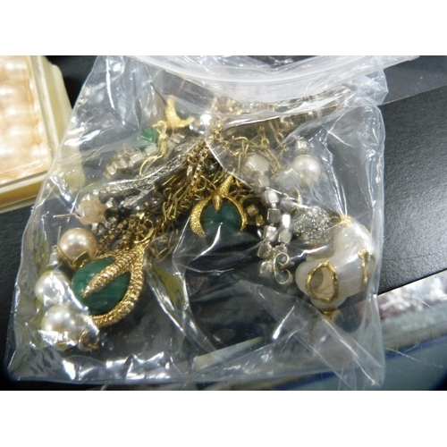 60 - Quantity of costume and other jewellery to include pendants, earrings, chains etc.