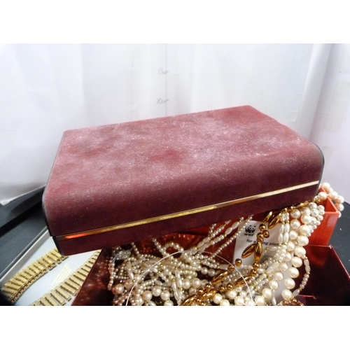 62 - Three small boxes containing costume and decorative jewellery to include pendants, rings, earrings, ... 