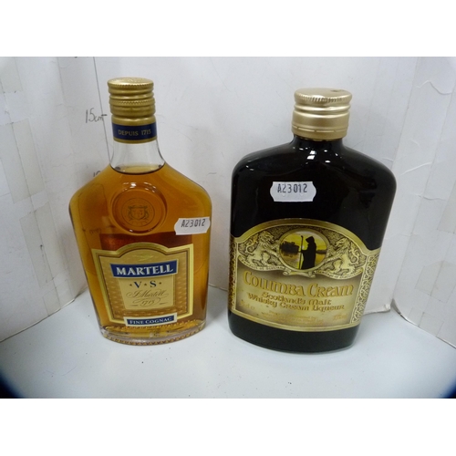 89 - Boxed bottle of Southern Comfort, 70cl, Morgan's Spiced Rum, 1 litre, a half bottle of Martell Fine ... 