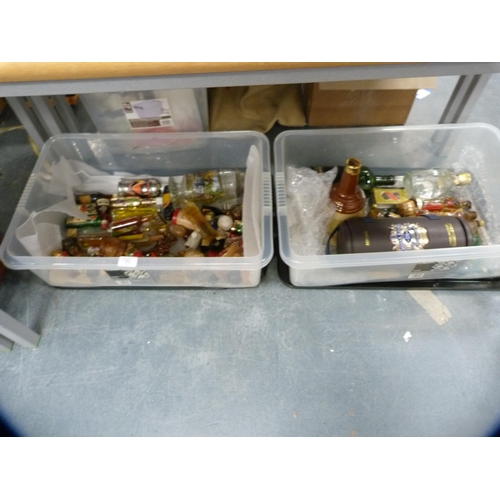 93 - Two cartons containing various whisky and liqueur miniatures.