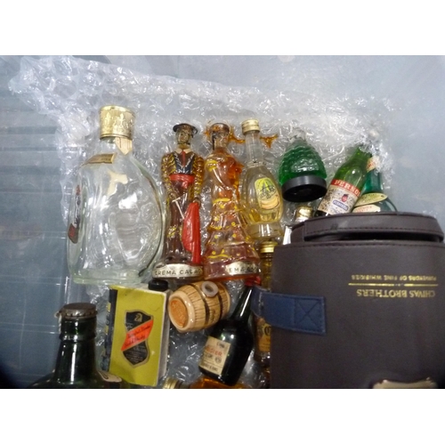 93 - Two cartons containing various whisky and liqueur miniatures.