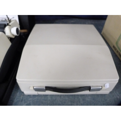 74 - Olympia typewriter, cased, and another.&nbsp; (2)