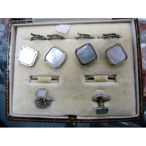 39A - Part set of sterling silver and mother of pearl studs and cufflinks, boxed.