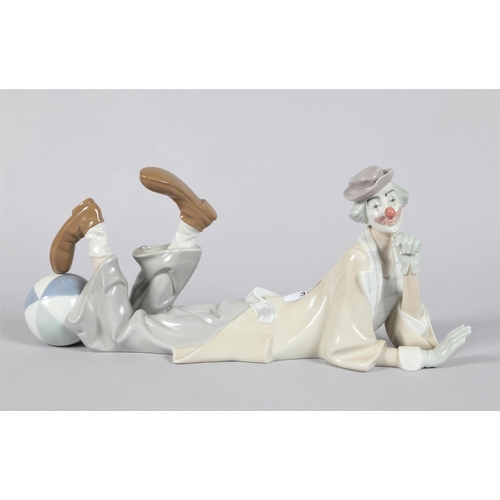 31 - Lladro figure of a clown; 38cm long