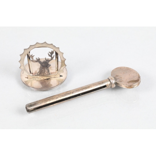 69 - Asprey & Co hallmarked silver 'key'; 8cm long; together with a hallmarked silver 'Deer' menu hol... 