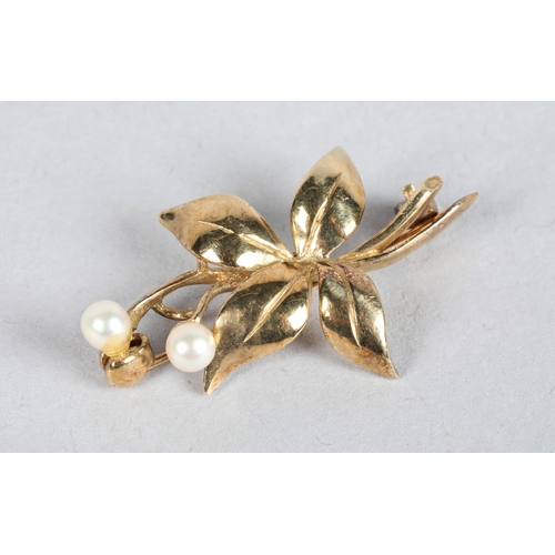 81 - 9 carat yellow gold and pearl set floral spray brooch; 3.1cm long; 3.1g gross weight