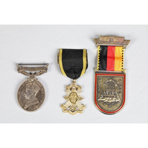 84 - 753590 Gnr. J. W. Fulton; R.A.; Efficient Service Medal; together with two other medals