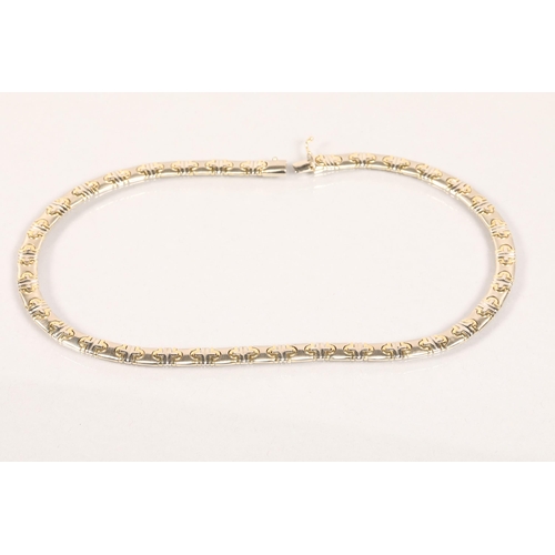 100 - 14 carat bi - coloured gold chain; 49.9g gross