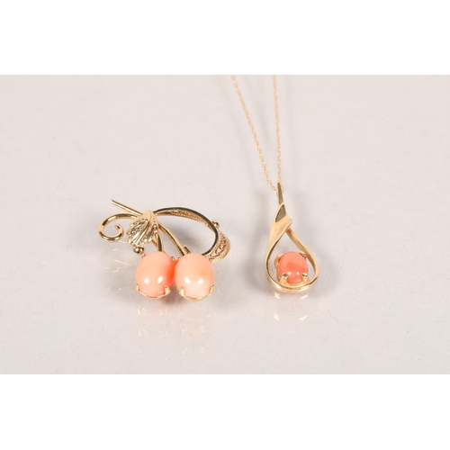 103 - Matching 9 carat yellow gold and red coral set brooch and pendant on chain; 7.1g gross weight