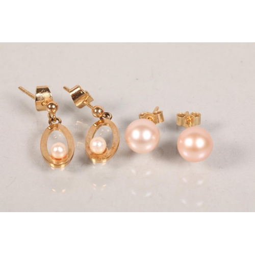 113 - Two pairs of 9 carat yellow gold and pearl set earrings