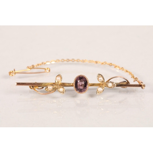 115 - 9 carat yellow gold Amethyst and seed pearl floral spray brooch; 2.3g gross weight