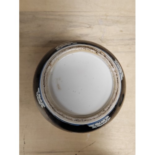 33 - Chinese Famille Noire Ginger jar and cover, 28cm tall