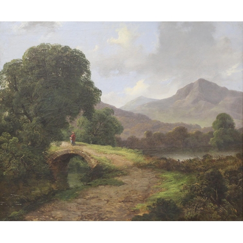 205 - 19th Century English School.A Lakeland landscape with figure crossing a packhorse bridge, possibly W... 