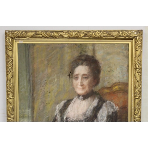 213 - Edwardian School.Three quarter length portrait of a seated lady in mourning dress.Chalk pastels.100c... 