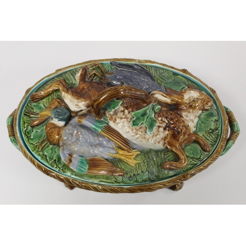 223 - Victorian Minton majolica game pie tureen of twin handled oval form, the relief moulded naturalistic... 