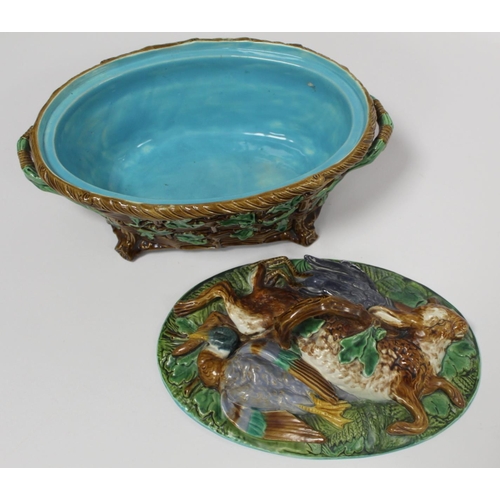 223 - Victorian Minton majolica game pie tureen of twin handled oval form, the relief moulded naturalistic... 