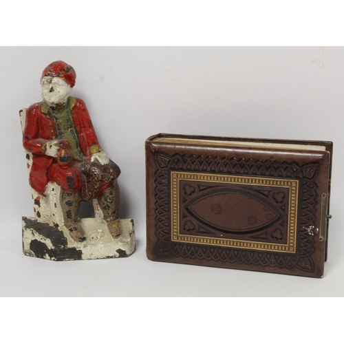 224 - Victorian polychrome painted cast iron doorstop in the form of a seated man with mug of ale, 24.5cm ... 