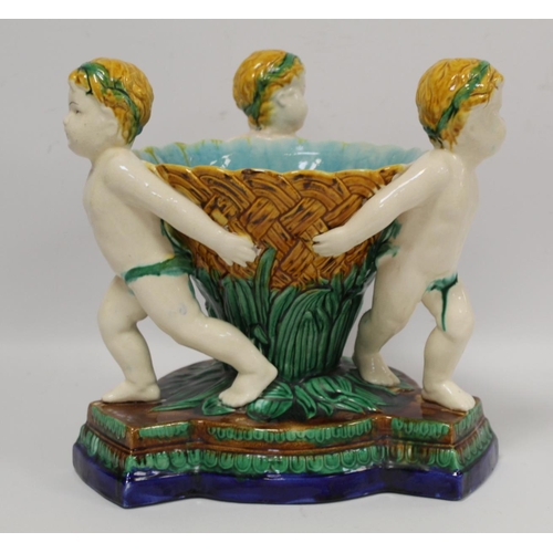 226 - Majolica Minton style table centre piece, the central conical bowl with basketweave and reed moulded... 